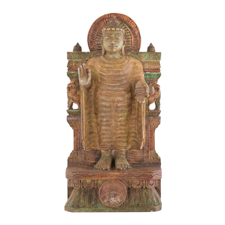 A wooden statue of Buddha with a polychrome finish, depicting the figure in a graceful blessing posture.