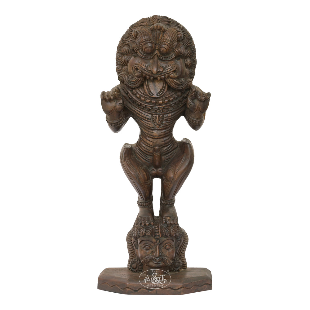 Wooden statue with intricate carvings on a white background