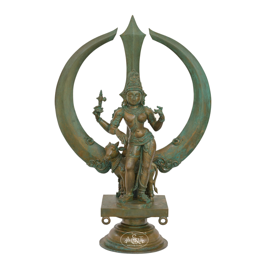 Bronze statue of a deity with crescent moon and sword on a white background