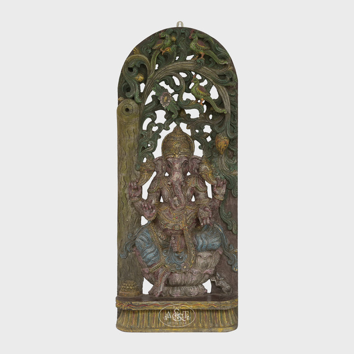 Decorative wall panel with intricate carvings on a white background