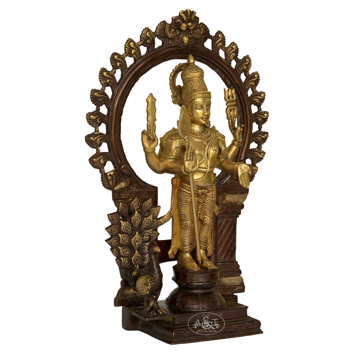 Bronze and gold statue of a deity with intricate design on a white background