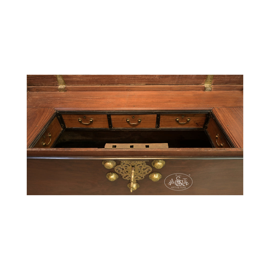 Wooden chest with brass hardware on a white background