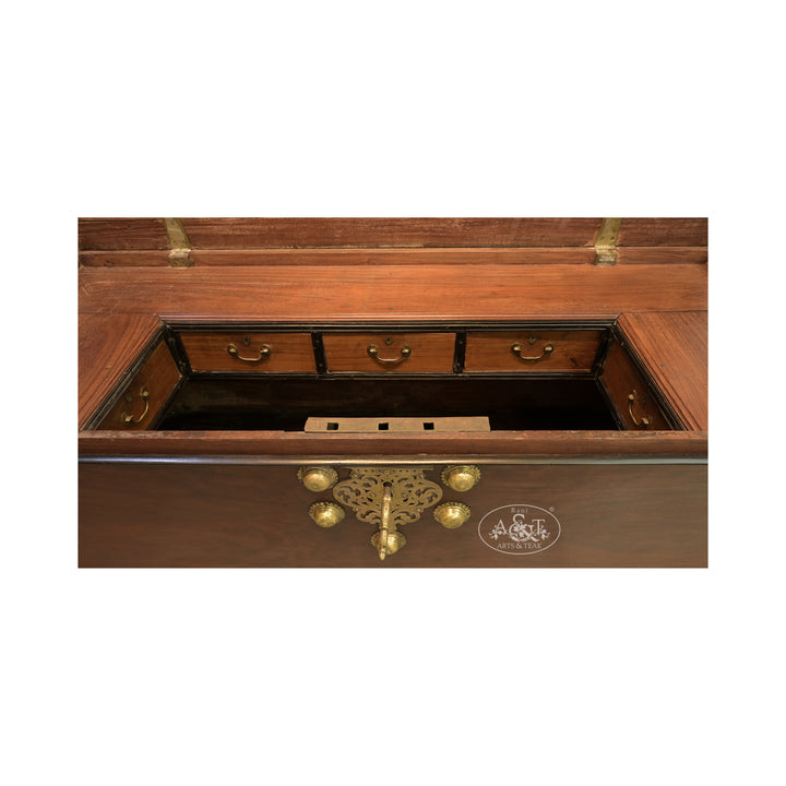 Wooden chest with brass hardware on a white background