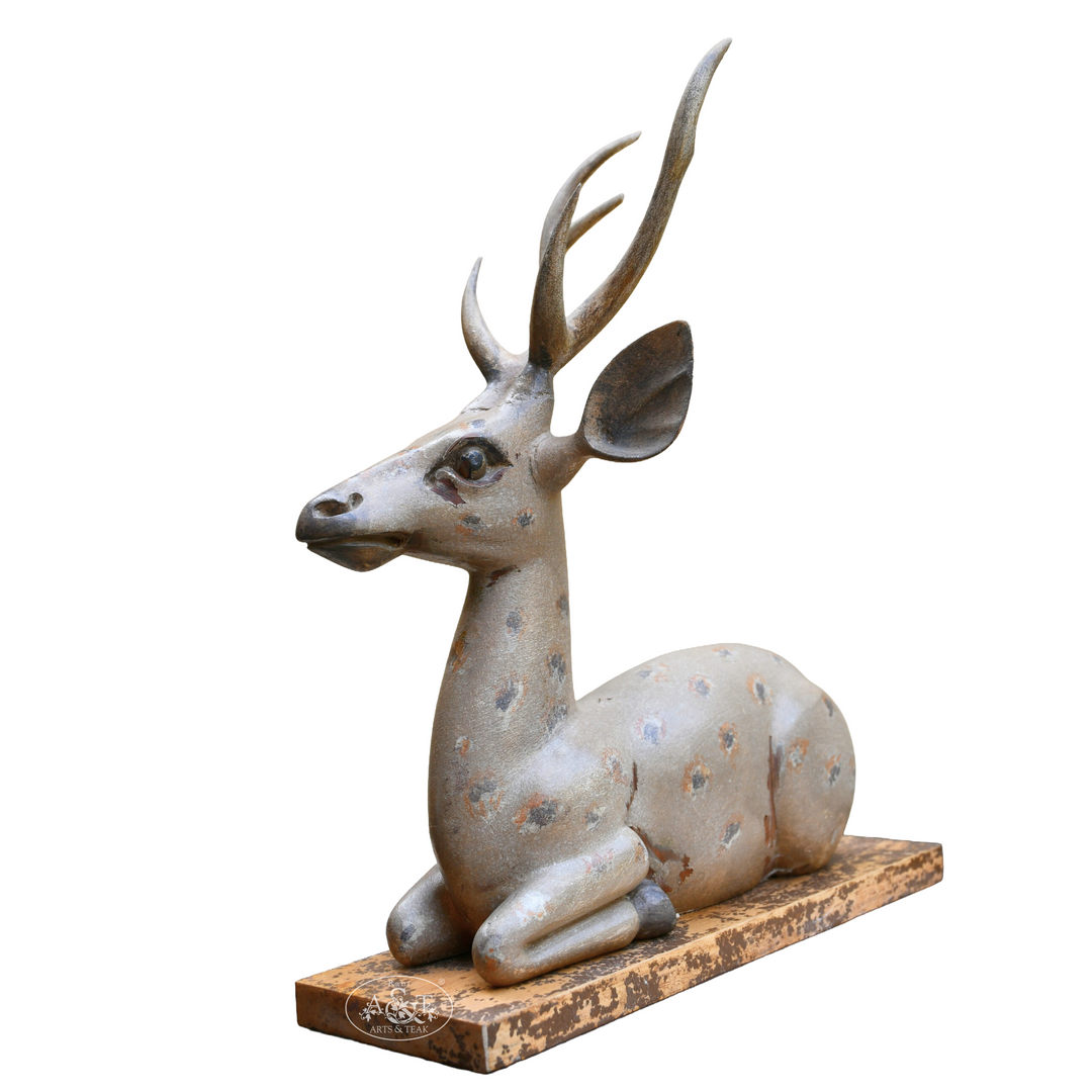 Decorative deer sculpture on a white background