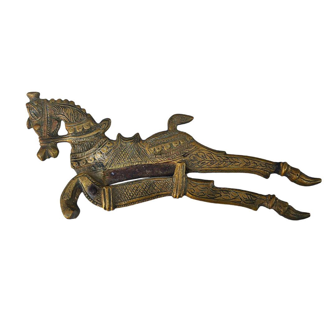 Decorative bronze horse figure on a white background