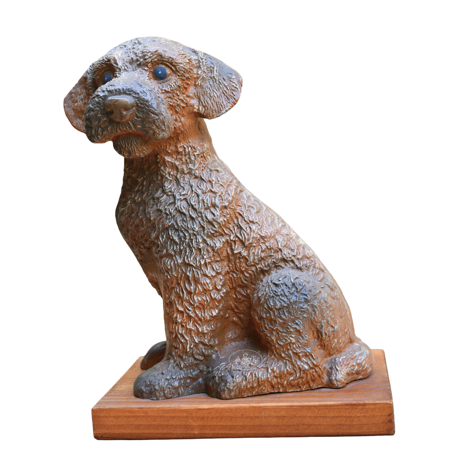 Dog statue on a wooden base with a white background