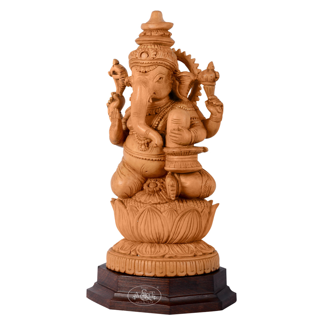 Wooden Baby Ganesh Holding Shivling