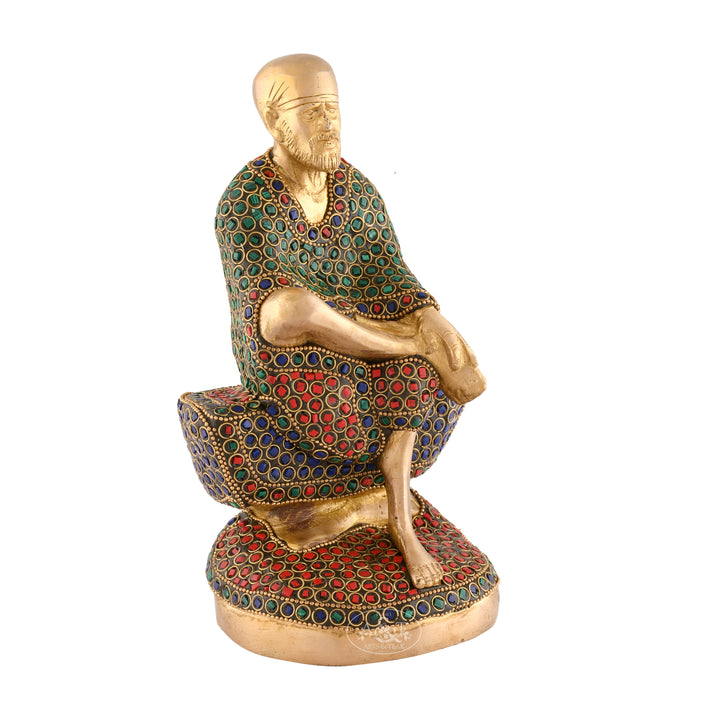 Seated Saibaba with enamel stone fitted