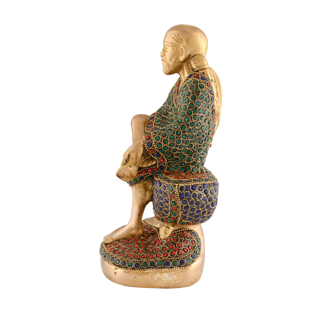 Seated Saibaba with enamel stone fitted